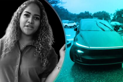 woman walks outside in the rain then she summons her tesla to pick her up 68c47524cfd85